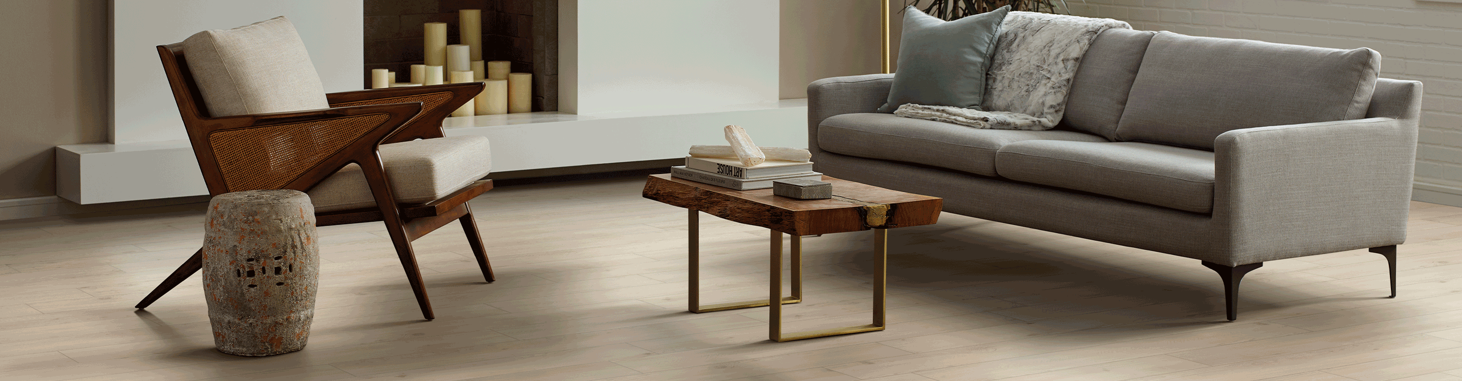 luxury vinyl plank flooring in midcentury modern living room with fireplace